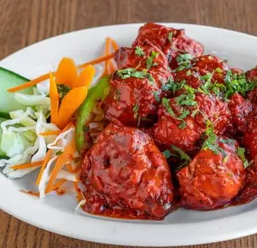Chicken tikka masala at Flames & Grills By Tuli's, Indian restaurant in NW Calgary